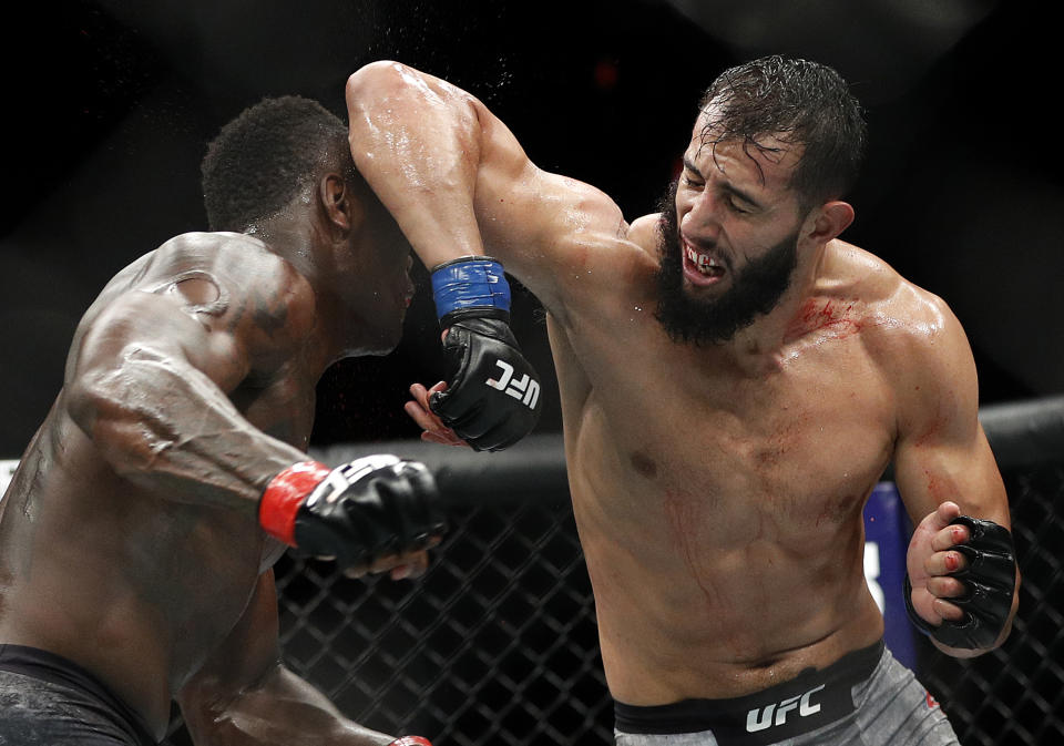 Dominick Reyes (R) hits Ovince Saint Preux with an elbow at UFC 229. Reyes won by by unanimous decision. (AP Photo/John Locher)