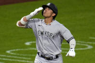 New York Yankees' Oswaldo Cabrera celebrates as he crosses home plate on a solo home run off Pittsburgh Pirates relief pitcher Thomas Hatch during the eighth inning of a baseball game in Pittsburgh, Saturday, Sept. 16, 2023. (AP Photo/Gene J. Puskar)