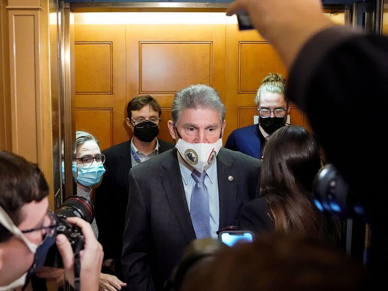 U.S. Senator Manchin faces reporters after meeting with White House officials on Capitol Hill in Washington