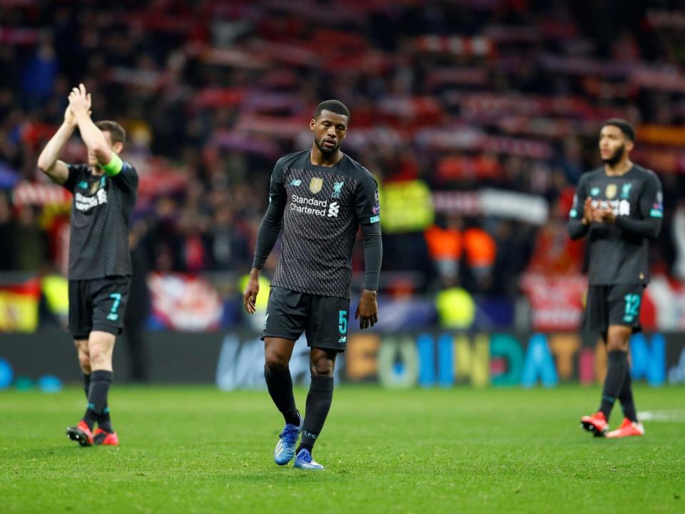 Liverpool's Georginio Wijnaldum looks dejected after defeat in Madrid: Reuters