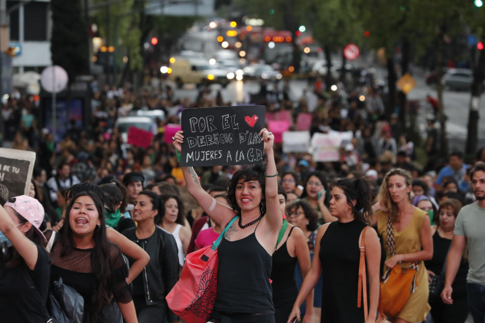 Women march during a protest demanding justice and for their safety, sparked by two recent alleged rapes by police, in Mexico City, Friday, Aug. 16, 2019. (AP Photo/Marco Ugarte)