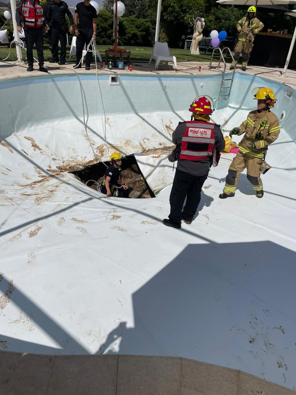 It took rescue workers four hours to retrieve the victim from the sink hole (Israel Fire and Rescue Service)