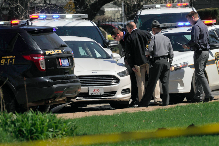 Police investigate the scene after Stephens killed himself in his car (AP)