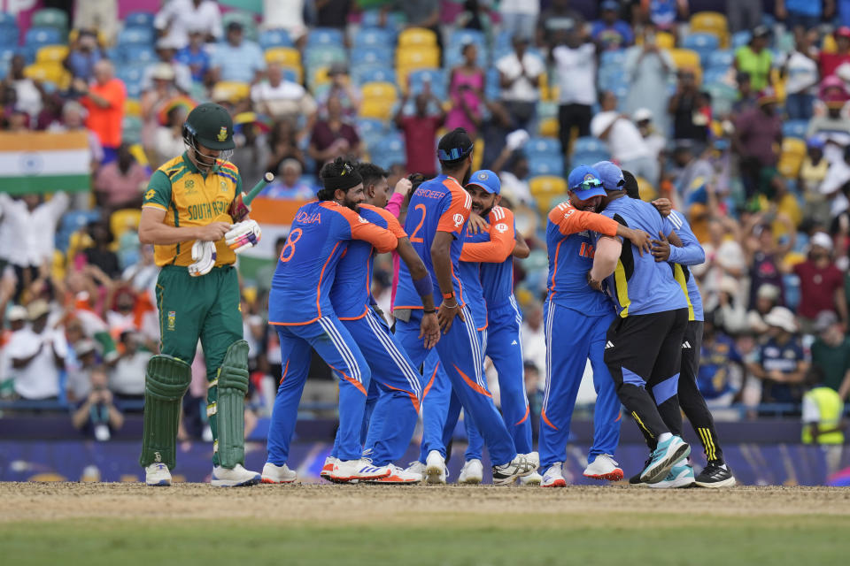 India's players celebrate their win against South Africa in the ICC Men's T20 World Cup final cricket match at Kensington Oval in Bridgetown, Barbados, Saturday, June 29, 2024. (AP Photo/Ramon Espinosa)