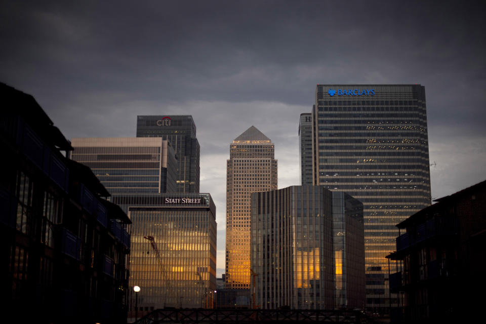 The early morning sun reflects on the financial buildings of Canary Wharf in east London. (Photo by Victoria Jones/PA Images via Getty Images)