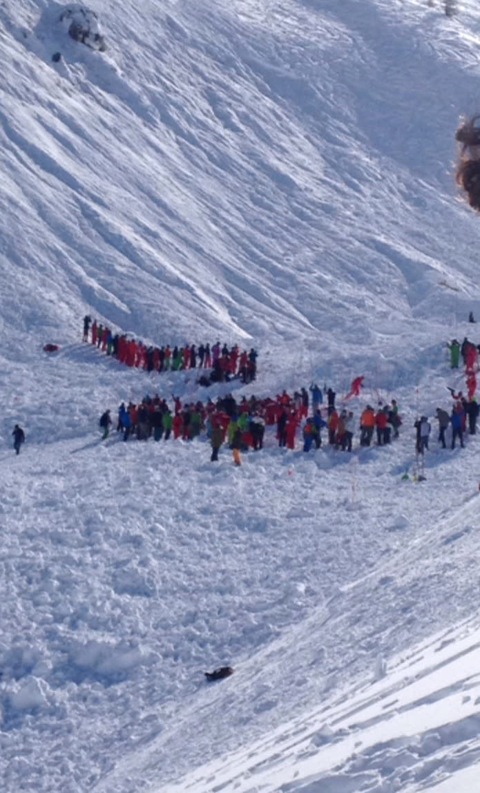 In this image made available by Victor Diwisch rescue personnel work at the site of an avalanche at Lavachet Wall in Tignes, France, Monday Feb. 13, 2017. French rescue workers say a number of skiers have been killed in an avalanche in the French Alps near the resort of Tignes. It occurred in an area popular among international skiers for its extensive slopes and stunning views, but no information was immediately available about the skiers' nationalities. (Victor Diwisch via AP)