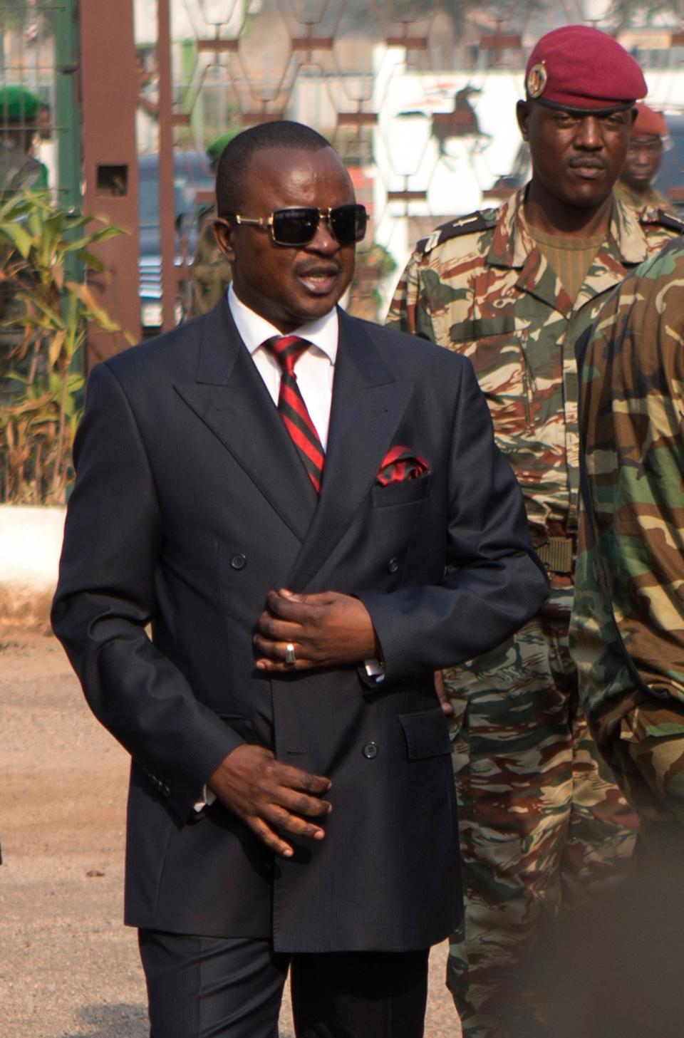 In this Wednesday, Jan. 8, 2013 photo, Alexandre Nguendet, president of the National Transition Council arrives at Mpoko Airport for a flight to neighboring Chad, in Bangui, Central African Republic. Michel Djotodia, the rebel leader who seized control of Central African Republic only to see the desperately poor country tumble toward anarchy and sectarian bloodshed, agreed to resign Friday along with his prime minister, regional officials announced. Djotodia's departure leaves the country in the hands of a weak transitional government. (AP Photo/Rebecca Blackwell)