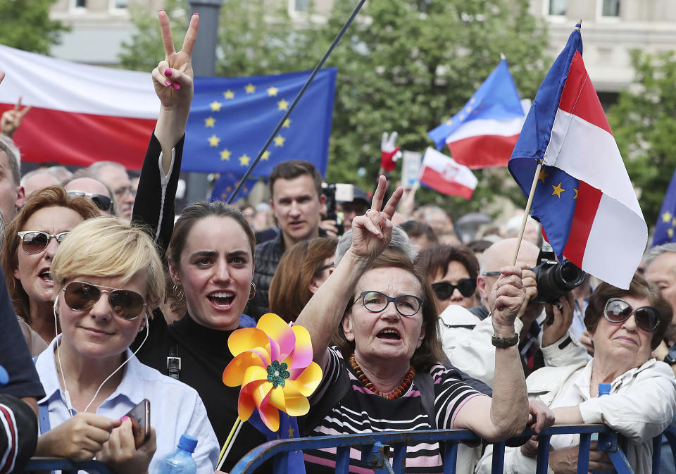 Thousands of Poles with pro-European banners march to celebrate Poland's 15 years in the EU and stressing the nation's attachment to the 28-member bloc ahead of May 26 key elections to the European Parliament, in Warsaw, Poland, Saturday, May 18, 2019.(AP Photo/Czarek Sokolowski)