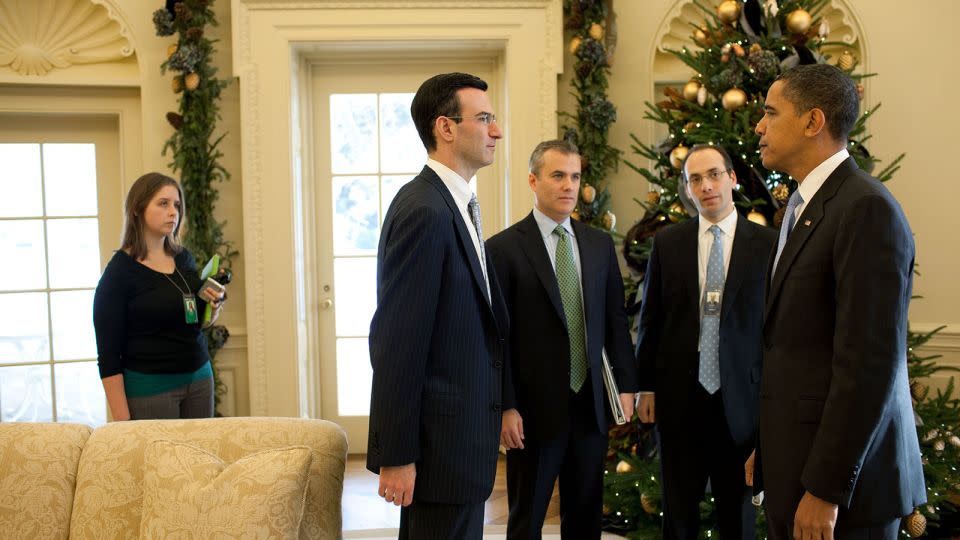 Kenneth Baer (second from right), a senior advisor at the Office of Management and Budget, meets in the Oval Office with President Barack Obama, OMB Director Peter Orszag and others on Dec. 21, 2009. - Pete Souza/The White House