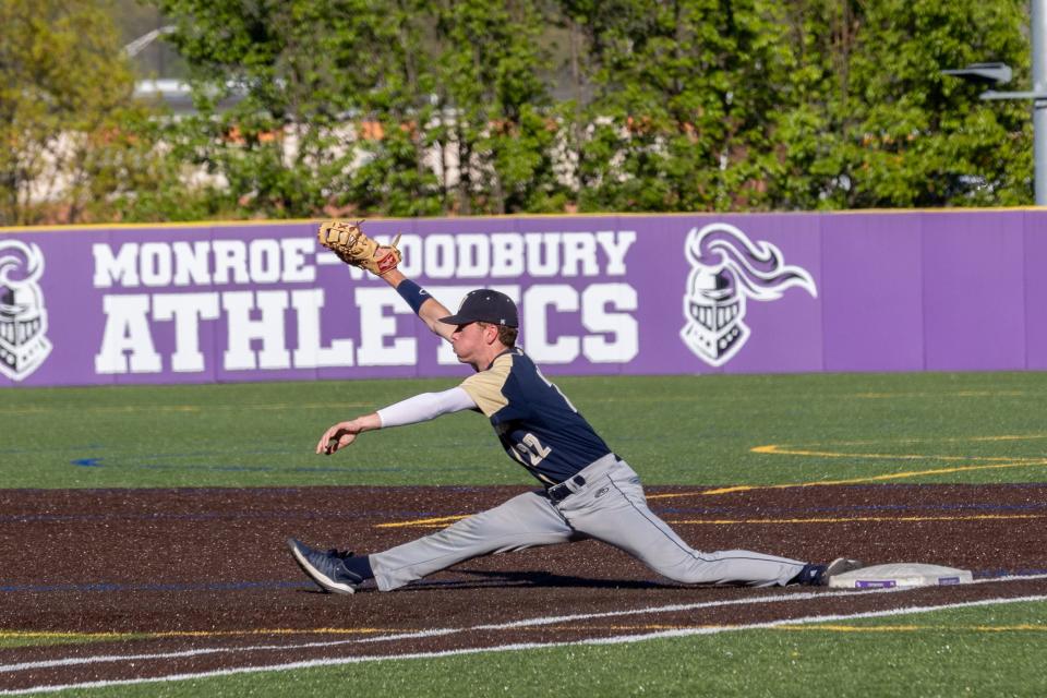 Newburgh's Jake Lanzer almost does a split to catch the ball at a Newburgh vs Monroe-Woodbury baseball game in Central Valley, NY on May 12, 2022. ALLYSE PULLIAM/For the Times Herald-Record.