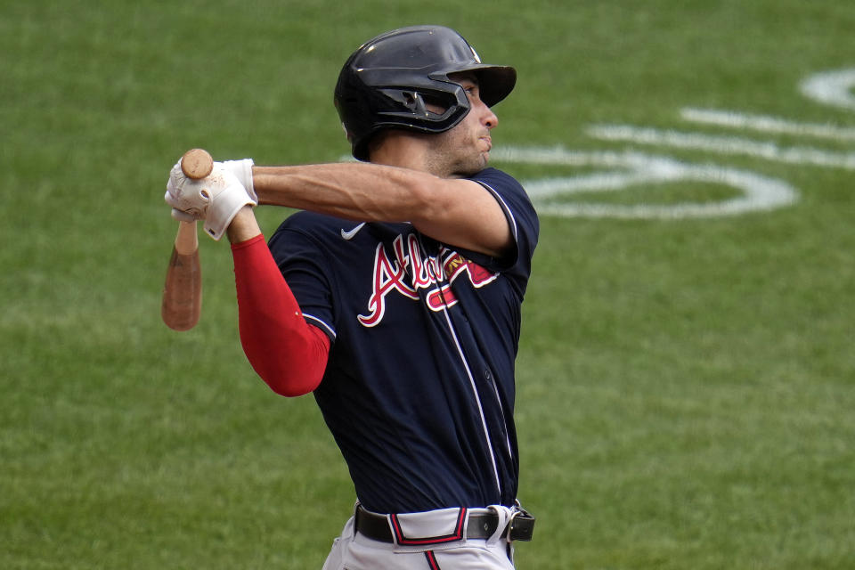 Atlanta Braves' Matt Olson follows through on a solo home run off Pittsburgh Pirates starting pitcher Bailey Falter during the third inning of a baseball game in Pittsburgh, Thursday, Aug. 10, 2023. (AP Photo/Gene J. Puskar)