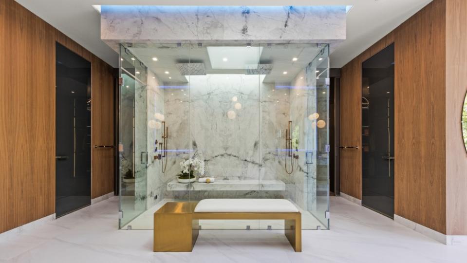 The primary bathroom has an incredible marble shower. - Credit: Joe Bryant