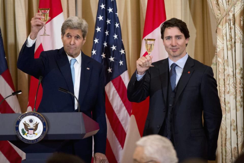 Secretary of State John Kerry makes a toast with Prime Minister Justin Trudeau during a luncheon meeting at the State Department in Washington, Thursday, March 10, 2016. (AP Photo/Manuel Balce Ceneta)