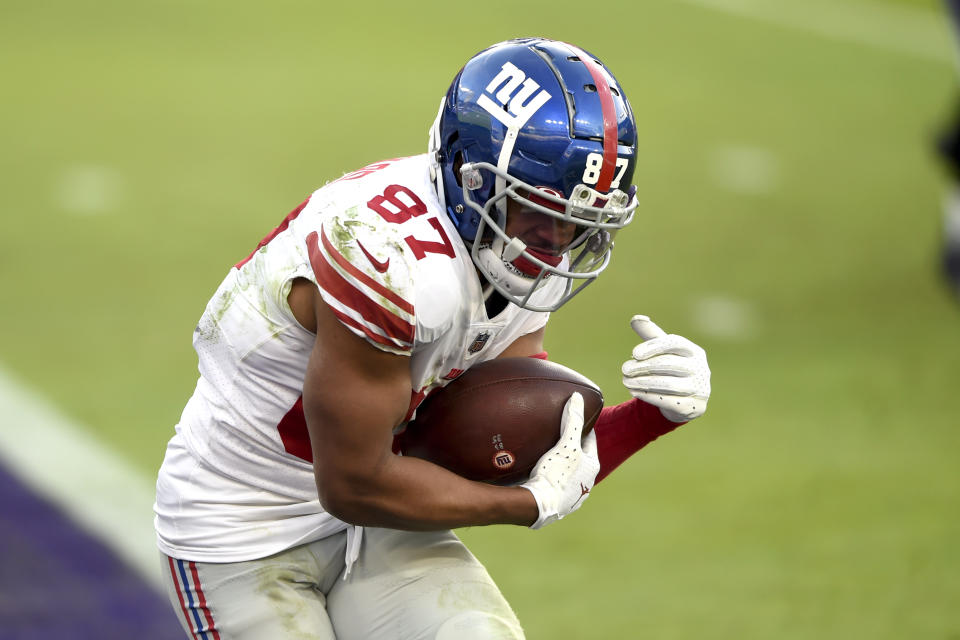 New York Giants wide receiver Sterling Shepard catches a touchdown pass from quarterback Daniel Jones during the second half of an NFL football game against the Baltimore Ravens, Sunday, Dec. 27, 2020, in Baltimore. (AP Photo/Gail Burton)