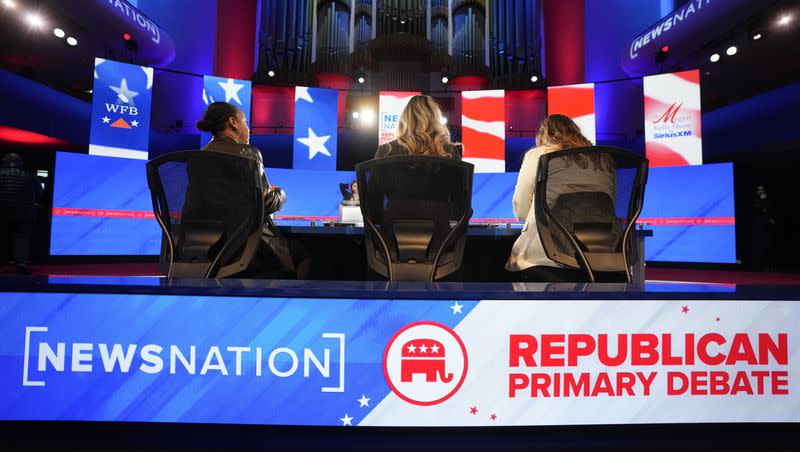 Stand-ins assume positions of candidates and moderators to check sound and lighting, in advance of a Republican presidential primary debate hosted by NewsNation on Wednesday, Dec. 6, 2023, at the Moody Music Hall at the University of Alabama in Tuscaloosa, Ala.