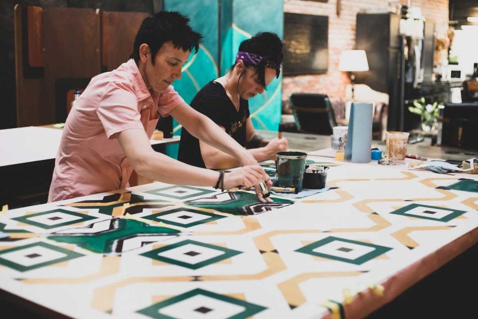 Brynn Gelbard and Lisa Donohoe mid-process at an event in their downtown L.A. studio.