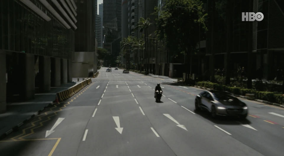 Evan Rachel Wood's character speeding down Robinson Road on a motorbike. 