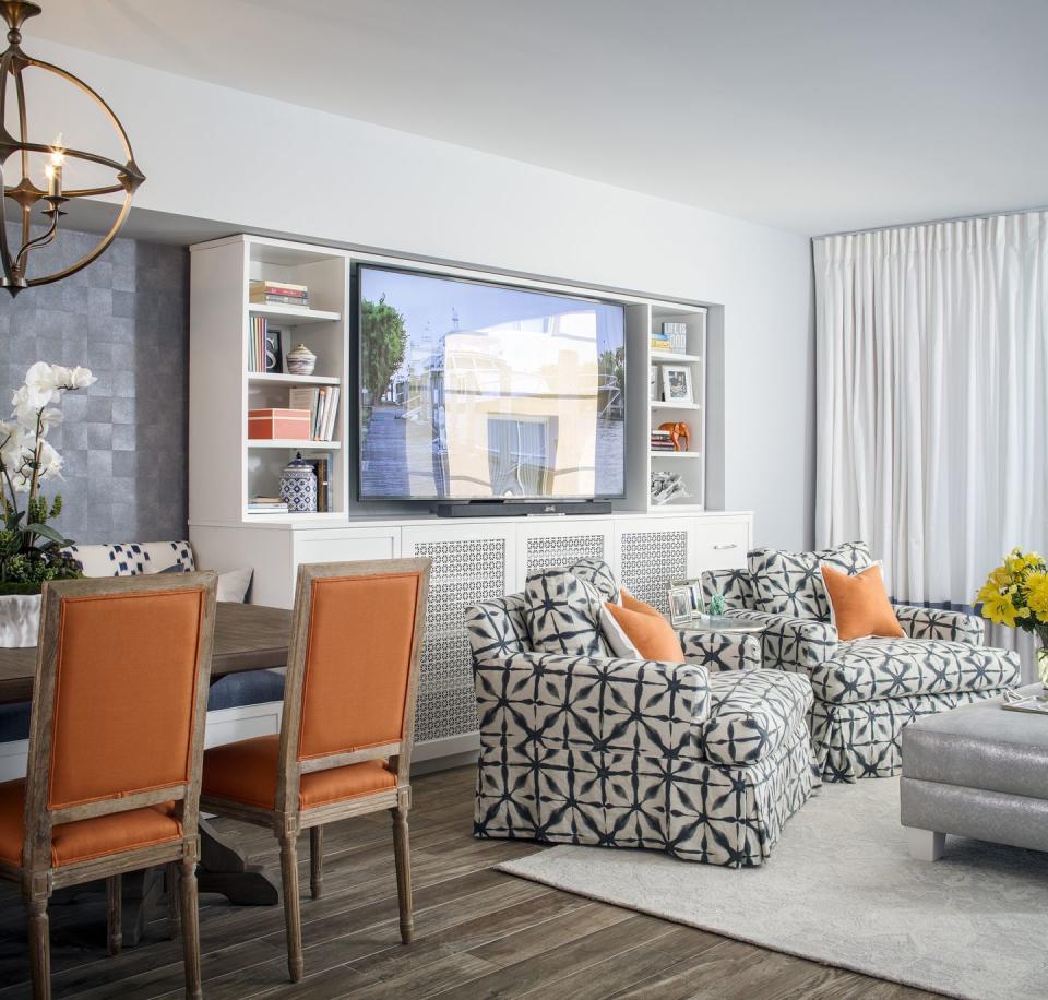 <p>Colors collide in a chic living space from <a href="https://deringhall.com/interior-designers/suza-design" rel="nofollow noopener" target="_blank" data-ylk="slk:Süza Design;elm:context_link;itc:0;sec:content-canvas" class="link ">Süza Design</a>.</p>