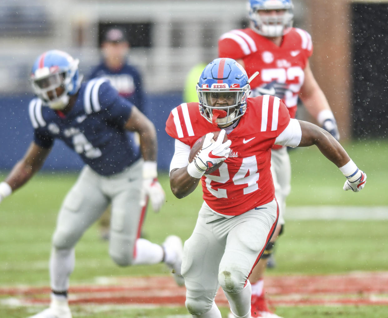 Cold and wet conditions plagued Ole Miss’ spring game last week. With more bad weather on the way, many other schools have canceled their spring games, (Bruce Newman/The Oxford Eagle via AP)