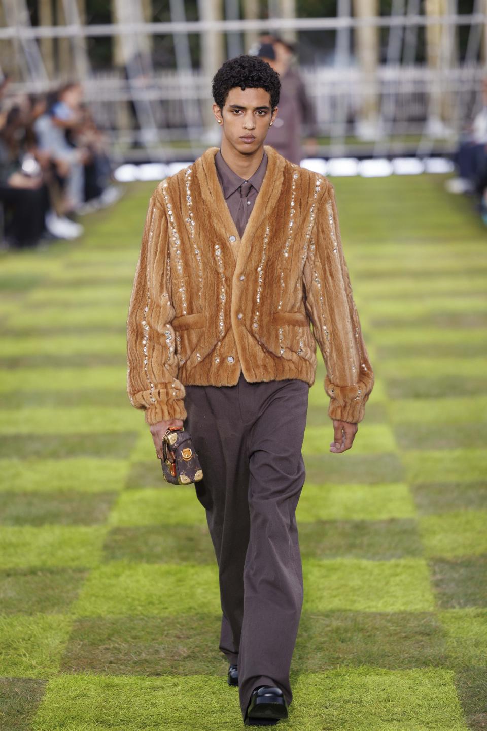 A model wears a creation as part of the Louis Vuitton Spring Summer 2025 collection, that was presented in Paris, Tuesday, June 18, 2024. (Photo by Vianney Le Caer/Invision/AP)