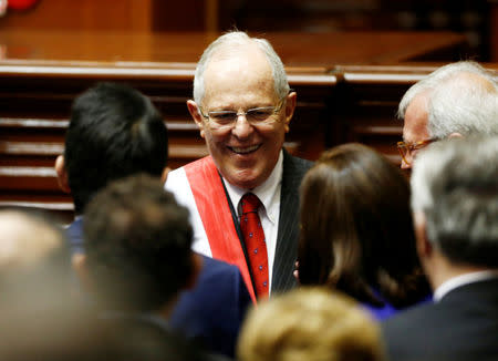 Peru's President Pedro Pablo Kuczynski (C) greets guests at the end of his inauguration ceremony in Lima, Peru, July 28, 2016. REUTERS/Mariana Bazo