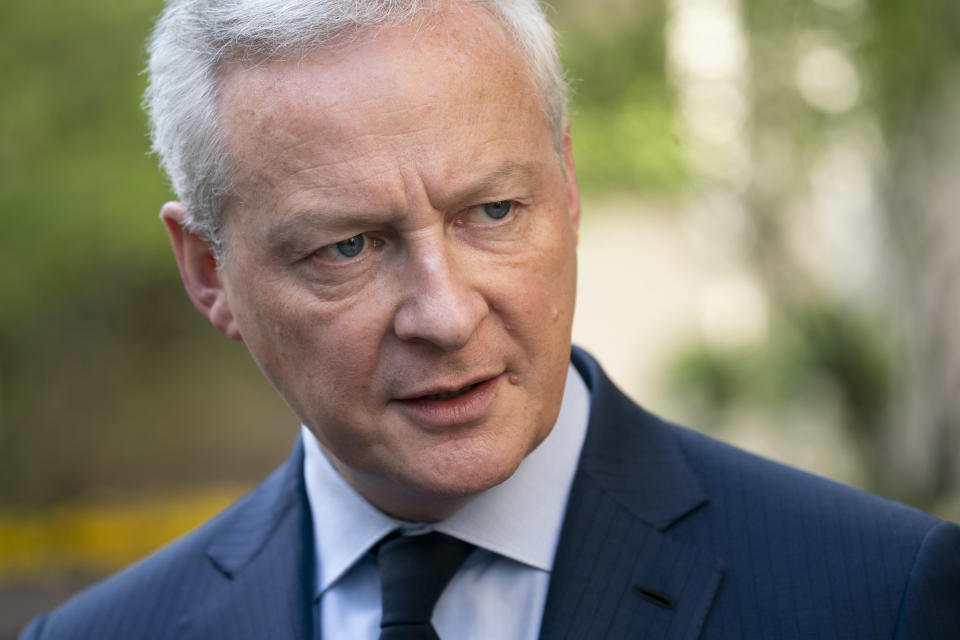 Bruno Le Maire, French Minister of Economy, speaks to members of the media outside the International Monetary Fund (IMF) headquarters in Washington, DC, on April 12, 2023.