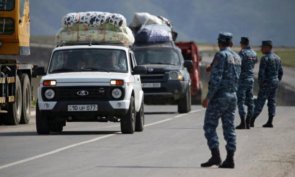 Refugees from Nagorno-Karabakh arrive in Kornidzor, Armenia on 29 September.