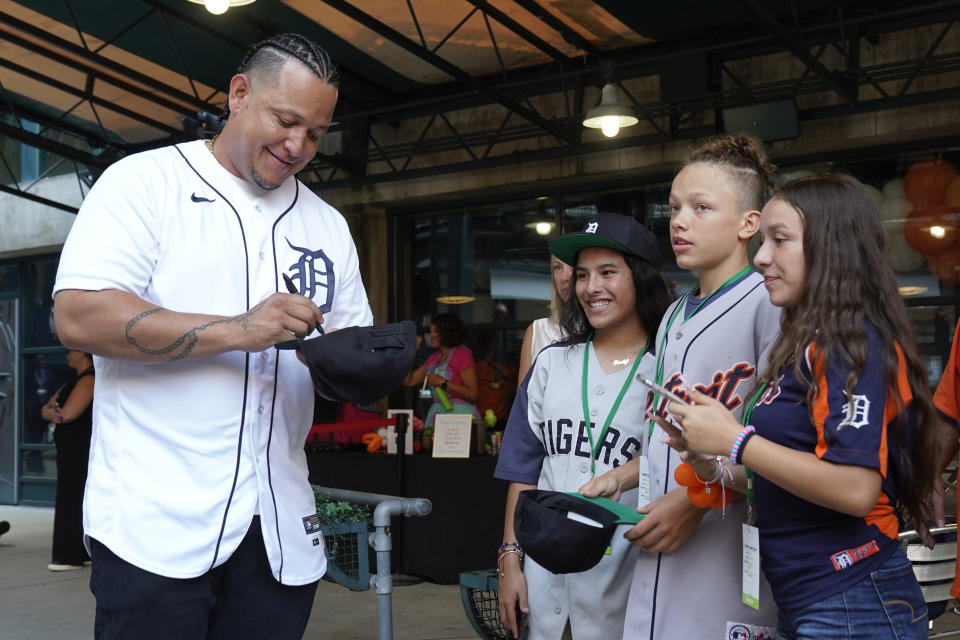 Detroit Tigers' Miguel Cabrera signs autographs at a Keeping Kids in the Game event at Comerica Park, Thursday, Aug. 24, 2023, in Detroit. Cabrera, one of the greatest hitters of all time, is retiring after the Tigers wrap up their season Sunday, Oct. 1, 2023, and baseball’s last Triple Crown winner is leaving a lasting legacy in the game and his native Venezuela. (AP Photo/Paul Sancya)