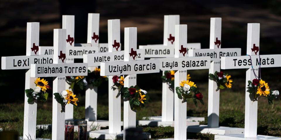 Crosses with the names of Tuesday's shooting victims are placed outside Robb Elementary School in Uvalde, Texas, Thursday, May 26, 2022.