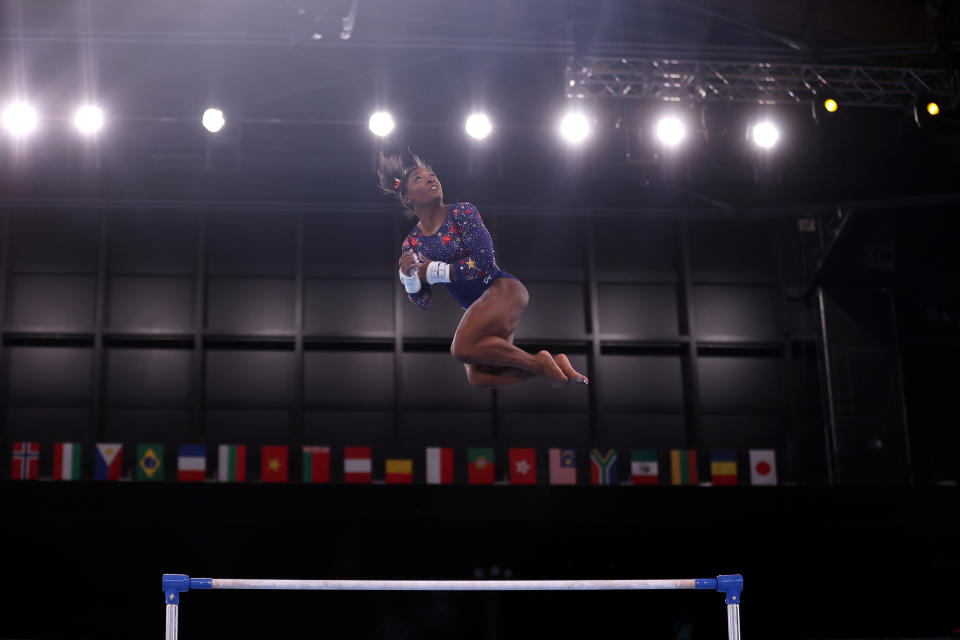 <p>TOKYO, JAPAN - JULY 25: Simone Biles of Team United States competes on uneven bars during Women's Qualification on day two of the Tokyo 2020 Olympic Games at Ariake Gymnastics Centre on July 25, 2021 in Tokyo, Japan. (Photo by Laurence Griffiths/Getty Images)</p> 