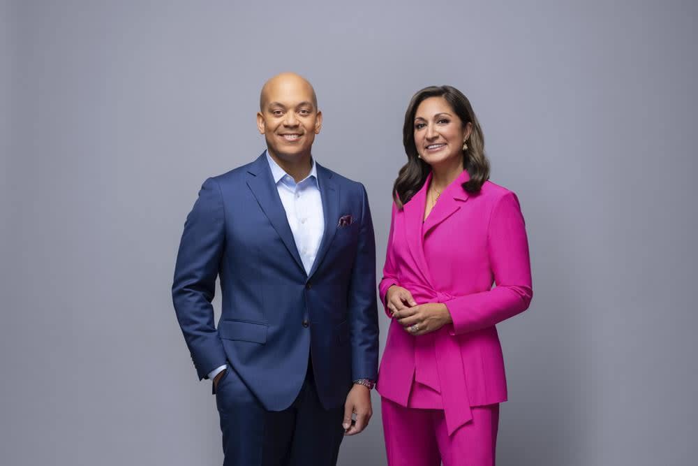 PBS NewsHour hosts Geoff Bennett, left, and Amna Nawaz appear in Alexandria Va., on Nov. 10, 2022. (Mike Morgan/PBS via AP)