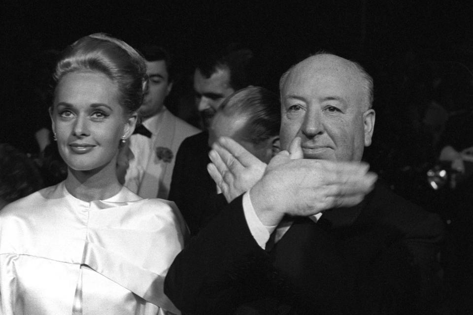 Tippi Hedren and Alfred Hitchcock miming a bird in the Cannes film festival, on the occasion of the presentation of the movie 