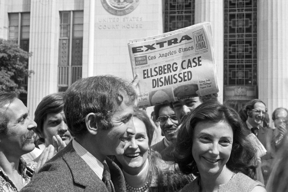 Daniel Ellsberg and wife walk from court after a federal judge has just dismissed the Pentagon Papers case against Ellsberg