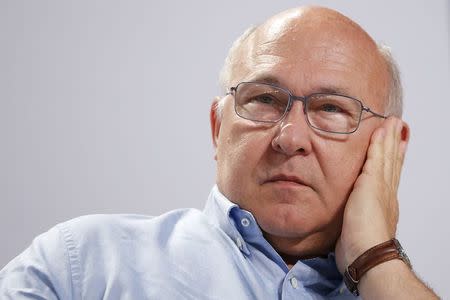 French Finance Minister Michel Sapin attends the Socialist Party's "Universite d'ete" summer meeting in La Rochelle, France, August 29, 2015. REUTERS/Stephane Mahe