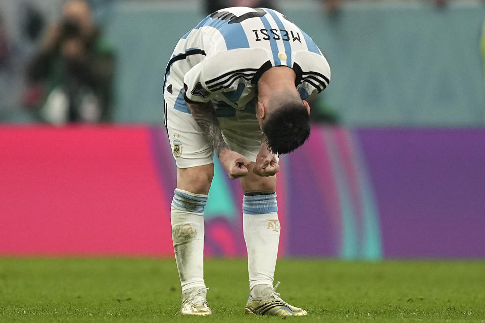 Argentina's Lionel Messi reacts after winning the World Cup semifinal soccer match between Argentina and Croatia at the Lusail Stadium in Lusail, Qatar, Tuesday, Dec. 13, 2022. (AP Photo/Martin Meissner)