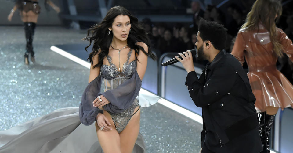 The Weeknd serenaded Bella Hadid at 2016’s Victoria’s Secret Fashion Show (Copyright: Getty/Kristy Sparow)