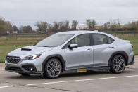 <p>This prototype of the forthcoming WRX wore red Brembo brake calipers and a body-coloured lip spoiler is found on the rear deck, and once again, all badging is covered in tape. All of this suggests a new updated trim level for the WRX for 2024.</p>