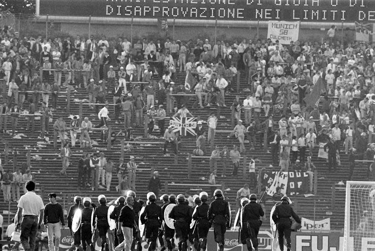 Belgian police face British fans at Heysel stadium in Brussels on May 29, 1985