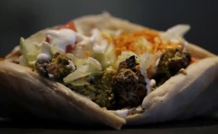 A vegetarian kebab is seen at OUR restaurant near the Saint-Lazare train station in Paris October 27, 2014. REUTERS/Christian Hartmann