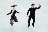 SOCHI, RUSSIA - DECEMBER 08: Tessa Virtue and Scott Moir of Canada perform in the Ice Dance Free Dance during the Grand Prix of Figure Skating Final 2012 at the Iceberg Skating Palace on December 8, 2012 in Sochi, Russia. (Photo by Julian Finney/Getty Images)