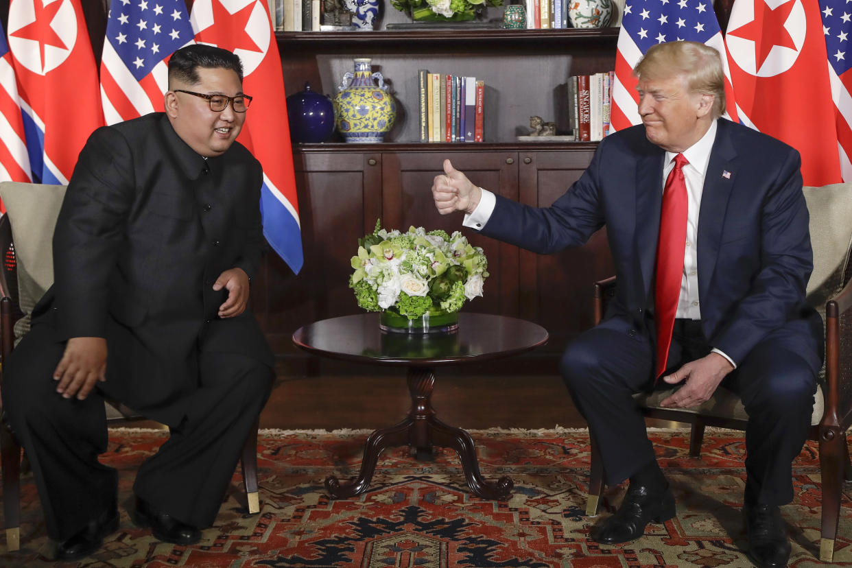 Donald Trump with Kim Jong Un at their meeting in Sentosa last June. (AP photo/Evan Vucci)