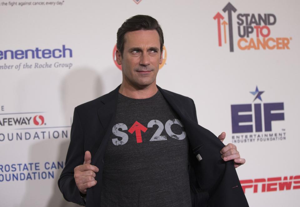 Actor Jon Hamm poses as he arrives for the fourth biennial Stand Up To Cancer fundraising telecast in Hollywood, California September 5, 2014. REUTERS/Mario Anzuoni (UNITED STATES - Tags: ENTERTAINMENT)