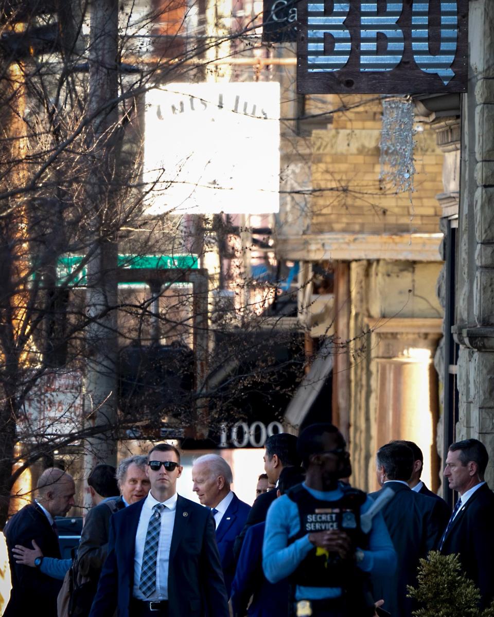 President Joe Biden leaves after stopping at Just Q'in BBQ restaurant in the Walnut Hills neighborhood of Cincinnati after speaking on a $1.6 billion federal investment in the long-awaited upgrade of the Brent Spence Bridge, Wednesday, Jan. 4, 2023, in Covington, Ky. The bridge spans the Ohio River connecting Ohio and Kentucky. Biden was joined by Ohio Gov. Mike DeWine, Kentucky Gov. Andy Beshear, Sen. Mitch McConnell and other state and local leaders.