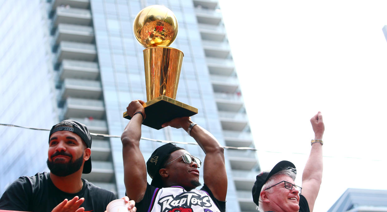 The Toronto rapper's performance at his multi-day festival included a welcomed appearance by the NBA championship trophy. (Photo by Vaughn Ridley/Getty Images)