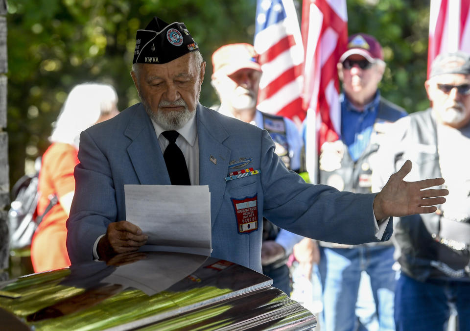 Korean Veteran Paul O'Keeffe speaks as Korean War veteran Army Cpl. Walter Smead, a member of Battery A, 57th Field Artillery Battalion, 7th Infantry Division who was killed during the 1950 Battle of the Chosin Reservoir, is laid to rest with full military honors at Gerald B. H. Solomon Saratoga National Cemetery, on Monday, Sept. 20, 2021, in Schuylerville, N.Y. Korean War veteran Army Cpl. Walter Smead, a member of Battery A, 57th Field Artillery Battalion, 7th Infantry Division who was killed during the 1950 Battle of the Chosin Reservoir, is laid to rest with full military honors at Gerald B. H. Solomon Saratoga National Cemetery, on Monday, Sept. 20, 2021, in Schuylerville, N.Y. Smead was finally laid to rest near his rural upstate New York hometown, seven decades after he was killed in the Korean War and months after his remains were finally identified with help from DNA analysis. (AP Photo/Hans Pennink)