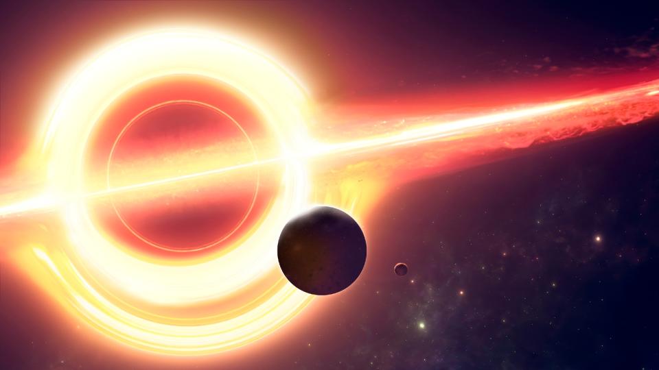 An artist's interpretation of a black hole's accretion disk with a planet close by