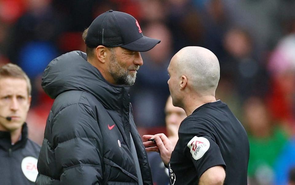 Referee Paul Tierney talks to Liverpool manager Jurgen Klopp - Reuters/Carl Recine