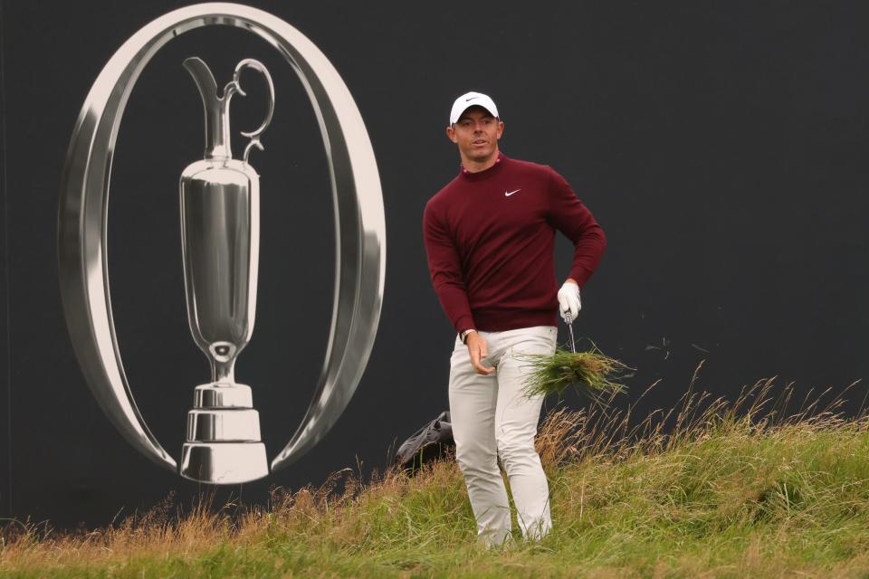 Rory McIlroy chips onto the 18th green during Tuesday's practice round for the British Open Golf Championship at Royal Liverpool Golf Club in Hoylake, England.