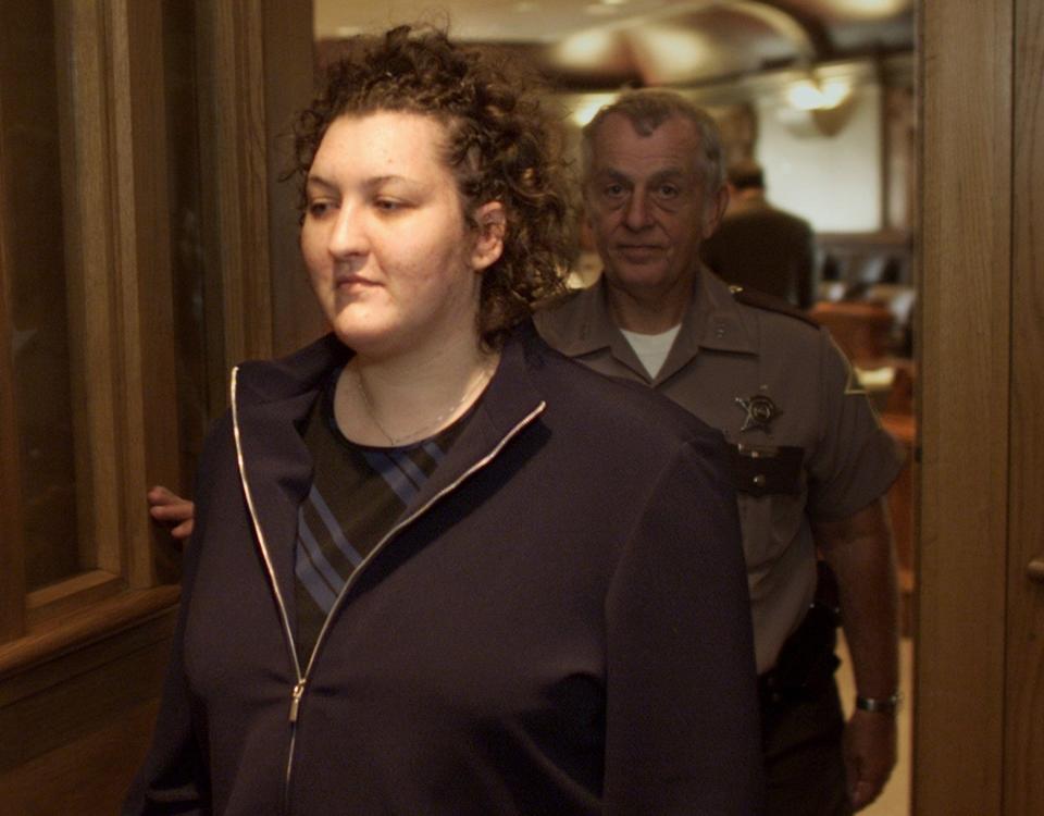 Anastazia Schmid leaves Tippecanoe Superior 2 on Oct. 2, 2002. Schmid is on trial for stabbing of her boyfriend and business partner Tony W. Heathcote.