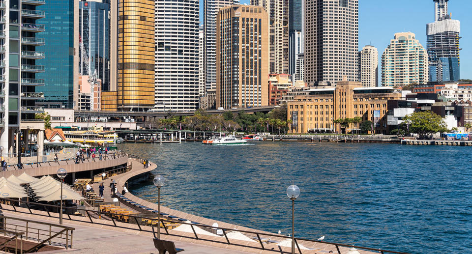 Waterfront promenade along the Circular Quay in  Sydney downtown district on a sunny day in Australia